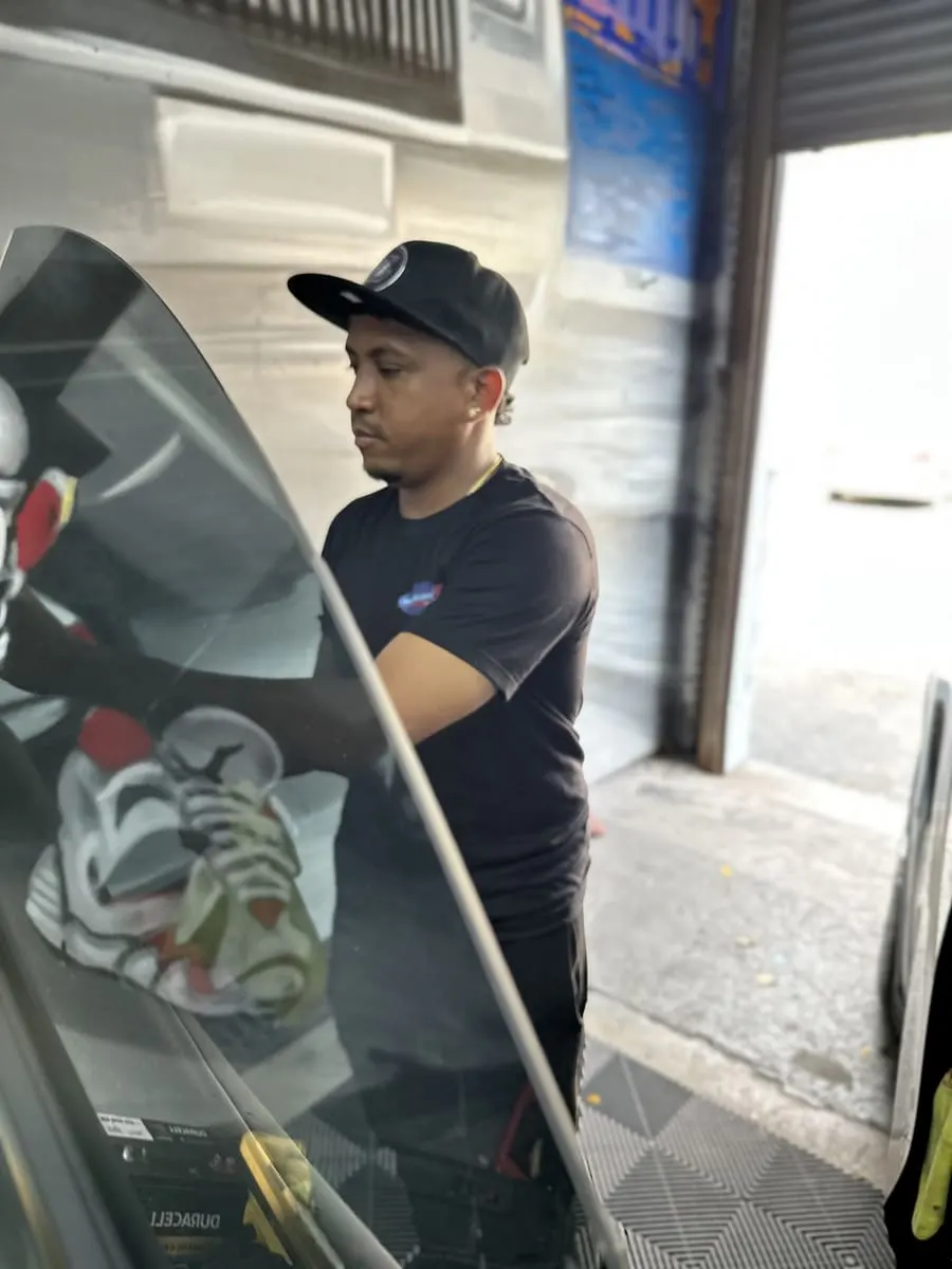 Galaxy Sound technician at work — Miami custom car shop